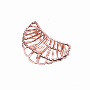 Minimalist rose gold hollow mesh fan shaped hair claw clip with polished metallic finish