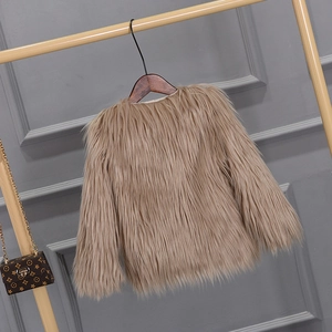 Detail of soft faux fur texture on girls khaki winter coat with elegant round collar