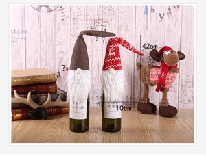 Detailed dimensions of 42x10cm Christmas gnome wine bottle covers in festive settings