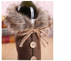 Macro detail of Christmas wine bottle cover with faux fur collar and wood buttons