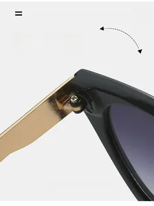 Macro shot of durable metal hinge on black square sunglasses with gold screw details
