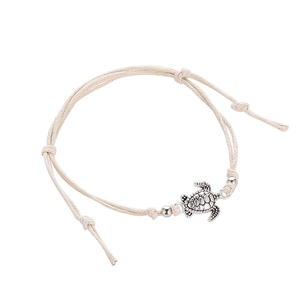 Handmade woven beige cord turtle anklet with vintage silver charms for beach wear
