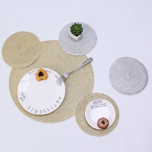 Nordic metallic woven heat-resistant table placemats in gold and silver spiral design