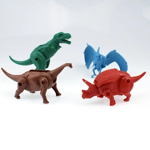 Detail view of 4 transformable dinosaur egg toys including T-Rex and Pterosaur