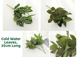 Macro detail of artificial Pilea leaves showing green-white and red-green texture patterns