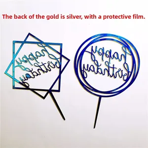 Detail view of mirror gold acrylic Happy Birthday cake topper with silver back and film