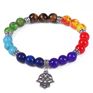 Detail of colorful 8mm natural stone beads and silver Hamsa Hand charm on yoga bracelet