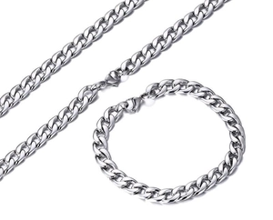 Macro view showing the glossy silver Cuban chain necklace and matching bracelet set
