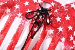 Detailed macro view of the lace-up neckline with metal eyelets on USA flag print t-shirt