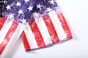 Detailed view of American flag print on knit fabric with precise purple stitching details