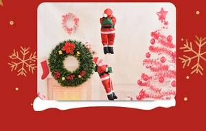 Detail of two climbing Santa Clause plush dolls on white rope for Christmas decoration
