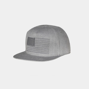 Gray flat brim hip hop hat with embroidered American flag in monochrome textured fabric