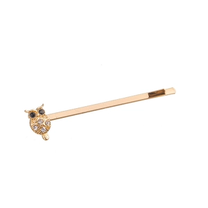 Golden owl hair clip set featuring alloy metal with sparkling rhinestone embellishments