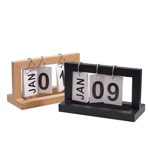 Minimalist wooden perpetual flip calendar in natural wood and black finishes