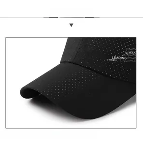 Detail of black breathable mesh baseball cap showing the symbol of LEADING embroidery
