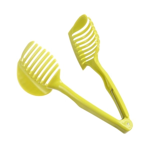Green handheld fruit slicer holder for slicing lemon tomato and potato uniformly