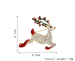 Détails d'une broche renne de Noël avec strass et dimensions précises de 4,1 cm par 4,9 cm