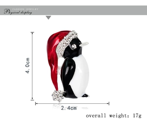 Detailed view of enamel penguin Christmas brooch with size and weight measurement markers