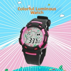 Close-up of kids digital sports watch featuring colorful luminous display function