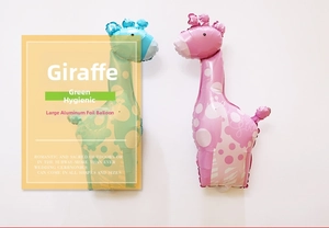 Large giraffe-shaped foil balloon detail in pink and blue for birthday party decoration