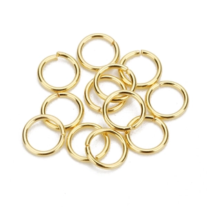 Macro shot of gold-plated stainless steel open rings for DIY jewelry connection