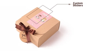 Detail of kraft paper gift box with brown ribbon bow and handmade tag in 45-degree view