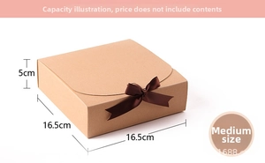 Detail view of a medium brown kraft gift box with a silk bow and 16.5x16.5x5cm dimensions