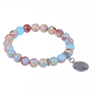 Serpentine stone bead bracelet with silver Tree of Life charm and palm pendant