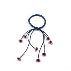 Floral hair tie with navy blue braided elastic rope and pink flower tassel charms