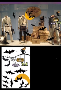 Detail of Halloween window clings set including bats black cat moon and spooky text