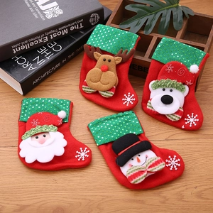 Set of 4 Christmas stockings with Santa, reindeer, bear, and snowman designs