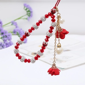 Red beaded phone lanyard with crystal beads, white pearls and floral tassel pendant