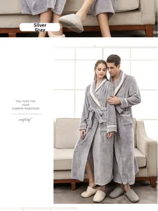 Detail of silver gray mink fleece bathrobe with contrast piping and belted waist