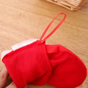 Detailed close-up of a red felt Christmas stocking featuring a durable ribbon hanging loop