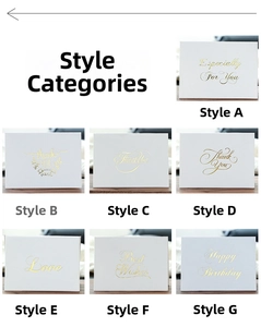 Detailed grid view showing seven assorted gold foil stamped greeting cards with envelopes