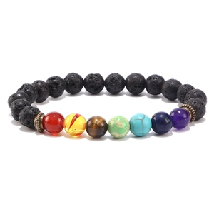 Detailed view of chakra lava stone bracelet with colorful beads and bronze spacers