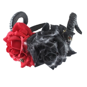 Detail showing Gothic ram horns headband with roses, spiderwebs, and insect decor