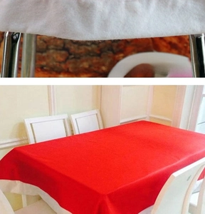 Macro detail of red and white tablecloth edges for Christmas festive dining decor