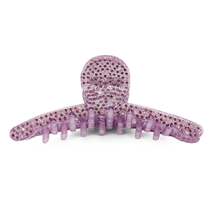 Detailed view of large purple shark hair clip with sparkling pink and clear rhinestones