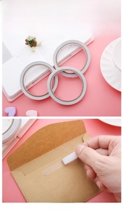 Detail of three-pack double-sided adhesive tape used for sealing paper envelopes