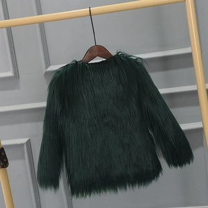 Detail of plush deep green faux fur coat texture with dense long-haired luxury fibers