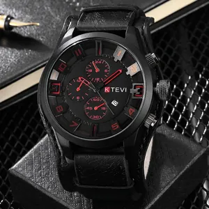 Close-up of KTEVI black chronograph watch with red hands and leather strap on mesh desk