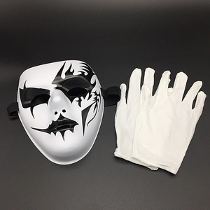 Detail view of white hip-hop mask with black flame pattern and matching white gloves