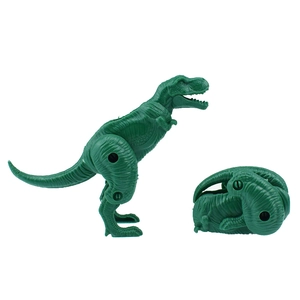 Detail showing the green T-Rex dinosaur toy transforming from an egg into a poseable figure