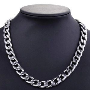Classic silver Cuban link chain necklace displayed on a professional black mannequin stand