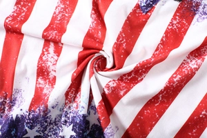 Close-up of soft cotton American flag print fabric showing star and stripe textures