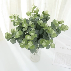 Artificial eucalyptus leaves in glass vase for Nordic minimalist home decoration