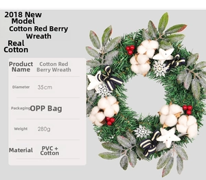 Détails d'une couronne de Noël de 35cm avec coton, baies rouges et aiguilles en PVC