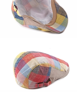 Detail of colorful plaid newsboy hat with metal buckle and soft breathable lining