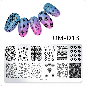 Macro view of OM-D13 nail plate showing star and flower patterns and printed nail tip